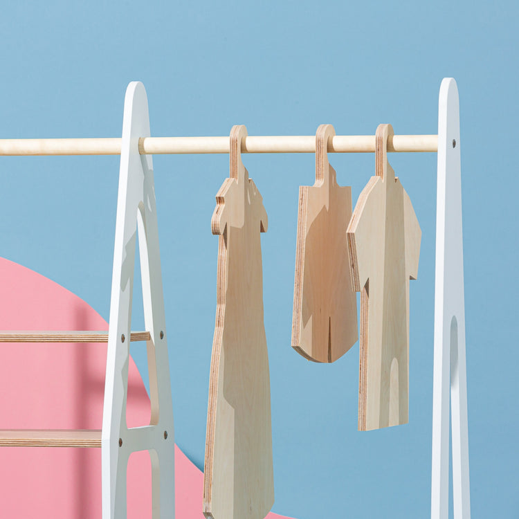 Duck Woodworks. Clothing rack with shelves on the side white