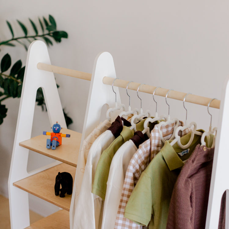 Duck Woodworks. Clothing rack with shelves on the side white