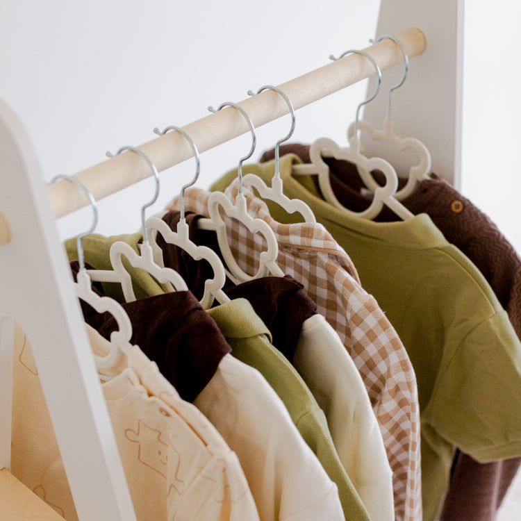 Duck Woodworks. Clothing rack with shelves on the side white