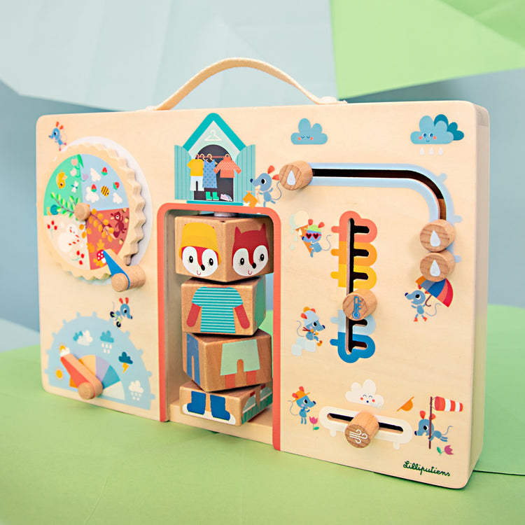 LILLIPUTIENS. Alice dresses for the weather suitcase