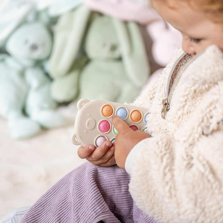 SILICON. Pop-it toy remote