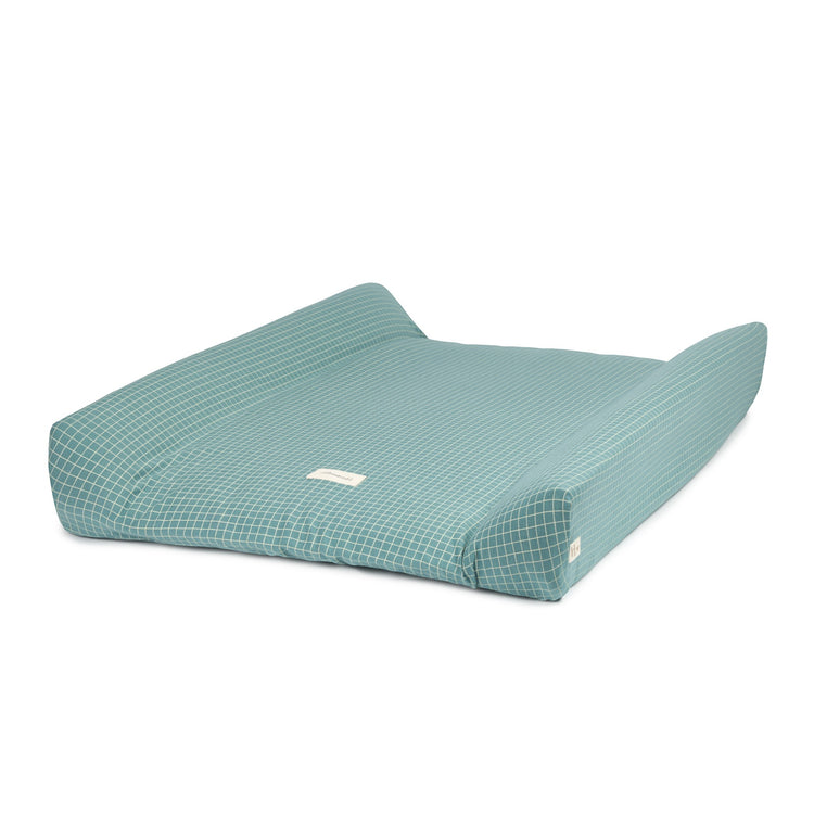 STORIES. Changing cover Limited edition - organic cotton jersey Teal Cream Grid 50x70