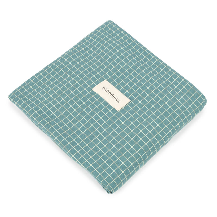 STORIES. Changing cover Limited edition - organic cotton jersey Teal Cream Grid 50x70